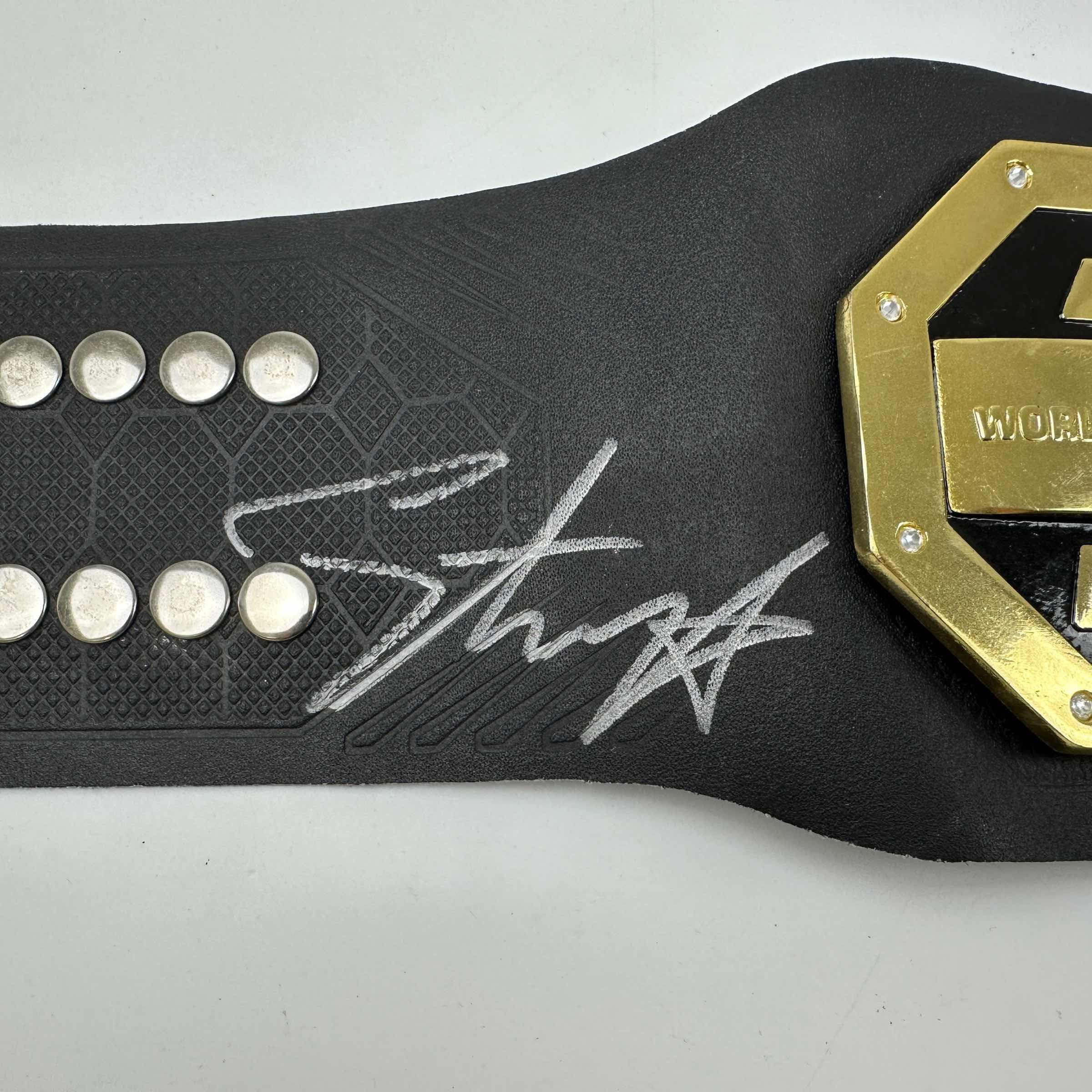 Autographed/Signed Israel Izzy Adesanya Black Replica UFC Championship Title Belt JSA COA